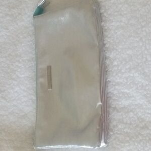 Clinique silver faux leather cosmetic makeup bag